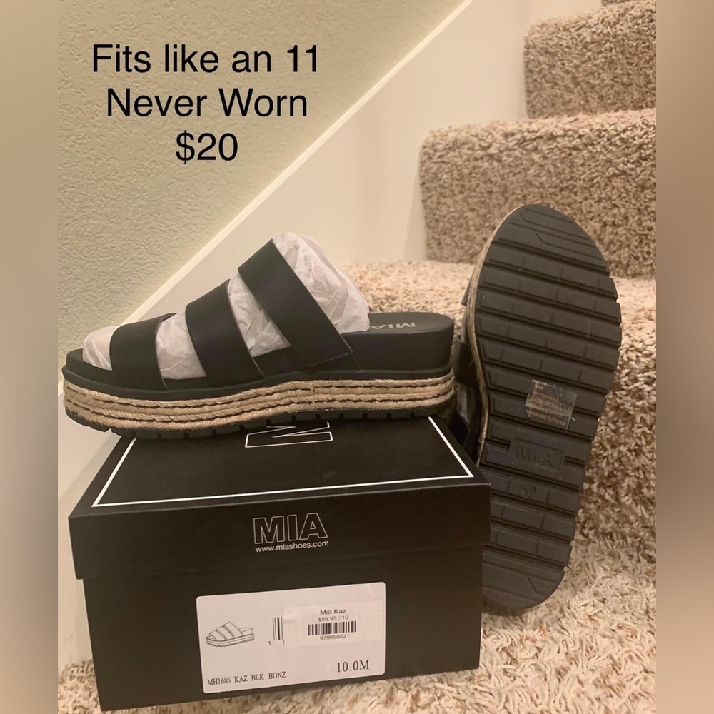 Never worn. Fits like a 10.5 or 11